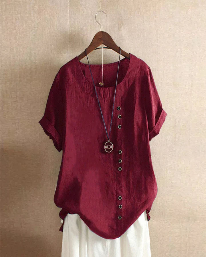 Kelly | Ensfarget kortermet bluse med rund hals
