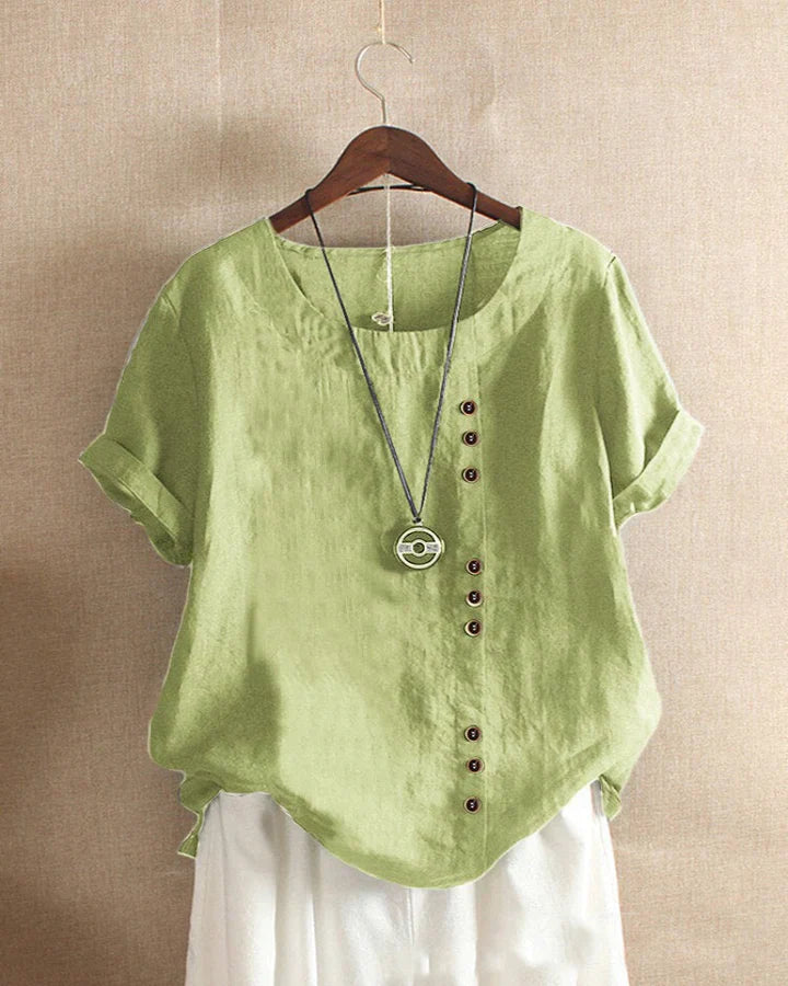 Kelly | Ensfarget kortermet bluse med rund hals