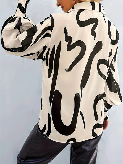 Elegant damebluse med luksuriøst design og plisserte ermer
